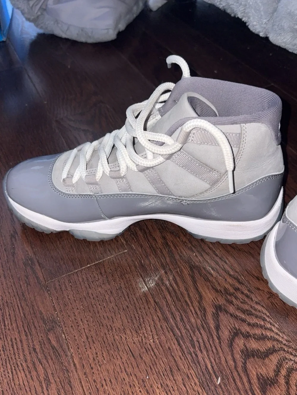 Jordan men’s  High-Top Sneakers in Gray and White